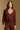 Model wearing the Saltwater Luxe Sutton Chocolate Sweater with ribbed texture, front view