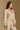 Model wearing the Saltwater Luxe Sutton Natural Sweater with ribbed texture, side view