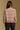 Model wearing the Saltwater Luxe Mimi Natural Sweater showing natural Fair Isle-inspired striped crewneck sweater, back view