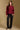 Model wearing the Saltwater Luxe Marri Burgundy Sweater with a softly textured knit, full-body view