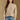 Model wearing the Saltwater Luxe Marri Natural Sweater with a softly textured knit, front view