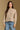 Model wearing the Saltwater Luxe Marri Natural Sweater with a softly textured knit, front view