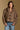 Model wearing the Saltwater Luxe Avelore Chai Jacket with an oversized shawl collar, front view