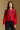 Model wearing the Saltwater Luxe Joss Crimson Sweater with a Fair Isle-inspired yoke, front view