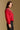 Model wearing the Saltwater Luxe Joss Crimson Sweater with a Fair Isle-inspired yoke, side view