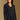 Model wearing the Saltwater Luxe Vionna Black Sweater with a textured knit, front view
