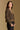 Model wearing the Saltwater Luxe Dovere Leopard Sweater leopard button-front cardigan sweater, side view