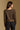 Model wearing the Saltwater Luxe Dovere Leopard Sweater leopard button-front cardigan sweater, back view
