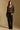 Model wearing the Saltwater Luxe Dovere Leopard Sweater leopard button-front cardigan sweater, full-body view