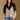 Model wearing the Saltwater Luxe Cain Natural Sweater with black colorblocking and chevron knit detail, front view