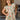 Girl model wearing Saltwater Luxe Littles Brammie Girls Mini Dress in Blue Floral standing outdoors near doorway