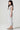 Girls Lucca Jumper side view highlighting flutter ruffle sleeves, elastic waist and breezy wide-leg silhouette