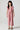 Front view of the Girls Lucca Jumper featuring pink stripes, flutter sleeves, and a wide-leg fit