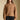 Front view of a woman wearing the Saltwater Luxe Aven Sweater on a neutral background with black pants