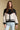 Front view of a woman wearing the Saltwater Luxe Azure Sweater on a neutral background with hands at sides