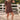 Front view of a woman wearing the Saltwater Luxe Ginna Mini Dress with hat and boots in a corral