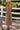 Front view of a woman wearing the Saltwater Luxe Calystah Midi Dress with a cowboy hat