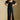 Front view of a woman wearing the Saltwater Luxe Drew Midi Dress and shoes on a neutral background with hands on hips