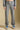 Front view of a woman wearing the Saltwater Luxe Heather Grey Pant on a neutral background with top