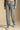 Front view of a woman wearing the Saltwater Luxe Heather Grey Pant on a neutral background with matching grey top