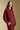 Side angle view of a woman wearing the Saltwater Luxe Half Zip Seam Pullover on a neutral background with hand in pocket