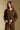 Front  view of a woman wearing the Saltwater Luxe Half Zip Seam Pullover on a neutral background with matching pants.