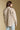 Back view of a woman wearing the Saltwater Luxe Ivah Jacket on a neutral background with jeans