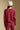Back view of a woman wearing the Saltwater Luxe Kevvy Pullover on a neutral background with hands at sides