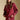 Front  view of a woman wearing the Saltwater Luxe Kevvy Pullover on a neutral background with matching crimson pants