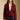 Front view of a woman wearing the Saltwater Luxe Klarke Sweater on a neutral background over white shirt