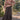 Front view of a woman wearing the Saltwater Luxe Maud Midi Skirt on a neutral background with sweatshirt