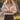 Front view of a woman wearing the Saltwater Luxe Ralie Skirt with Fiorra Sweater