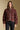 Front view of a woman wearing the Saltwater Luxe Deeda Jacket on a neutral background with blue jeans and arms at sides