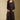 Front view of a woman wearing the Saltwater Luxe Selah Midi Skirt on a neutral background with and matching Nera top