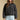 Front view of a woman wearing the Saltwater Luxe Tamira Jacket on a neutral background with bluejeans