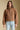 Front view of a woman wearing the Saltwater Luxe Tovie Jacket on a neutral background with jeans