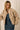 Front view of a woman wearing the Saltwater Luxe Tovie Jacket over the Haydin Mini