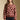 Front view of a woman wearing the floral Saltwater Luxe Vincent Sweater on a neutral background with arms lowered