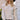Front view of a woman wearing the Saltwater Luxe  Jeri Sweater in an outdoor setting