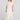Full body front view of a woman wearing the Saltwater Luxe Selah Midi Skirt on a neutral background
