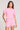 Front view of a woman wearing the Saltwater Luxe Short Sleeve Petunia Pullover on a neutral background