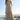 Front view of a woman wearing the Saltwater Luxe Stein Midi Dress on the beach
