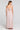 Back view of a woman wearing the Saltwater Luxe Taytum Maxi Dress on a neutral background