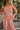 Font view of a woman wearing the Saltwater Luxe Tremont Tank in Coffee in front of a tree
