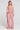 A full body front view of a woman wearing the Saltwater Luxe Tremont Tank in Coffee on a neutral background
