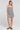 A full body front view of a woman wearing the Saltwater Luxe Viena Tank on a neutral background
