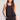 Front view of a woman wearing the Saltwater Luxe Woven Black A-Line Tank on a neutral background