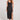 Front view of a woman wearing the Saltwater Luxe Woven Black Tank Midi Dress on a neutral background