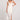 Front view of a woman wearing the Saltwater Luxe Woven Ecru Tank Midi Dress on a neutral background