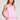 Side angle view of a woman wearing the Saltwater Luxe Woven Petunia A-Line Tank on a neutral background